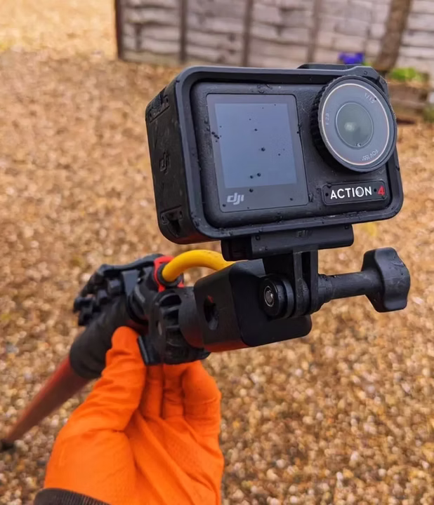 Action camera being used to inspect residential guttering
