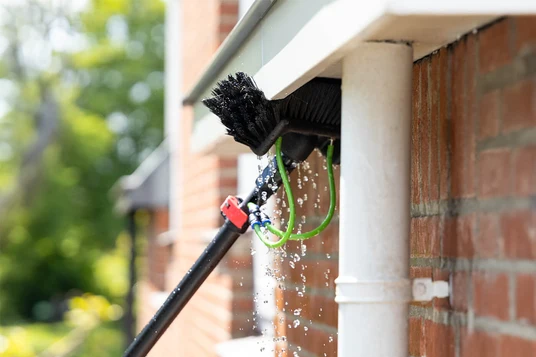 Professional fascia cleaning on a residential property
