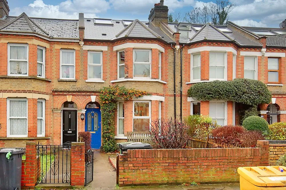 Terraced house requiring residential gutter cleaning