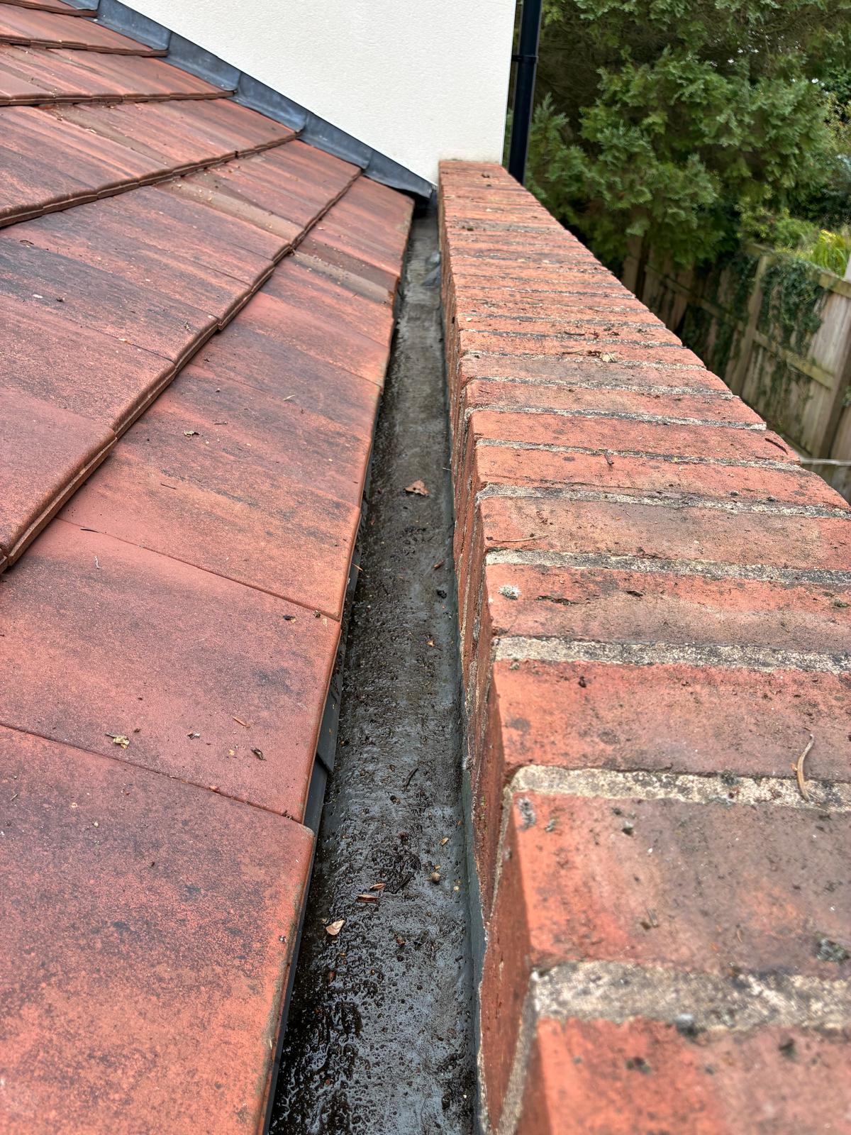 Gutter after professional cleaning in Woodford Stockport